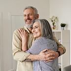 MEM_ElderlyCoupleEmbracing